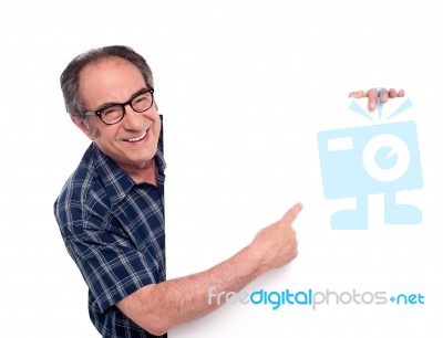 Old Man Pointing At Blank board Stock Photo