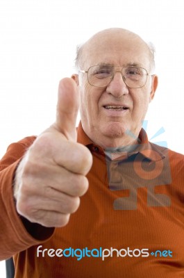 Old Man Showing Thumbs Up Stock Photo