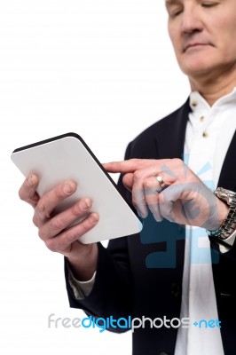 Old Man Using His Tablet Pc Stock Photo