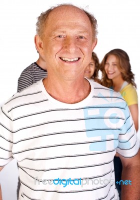 Old Man With Family Stock Photo