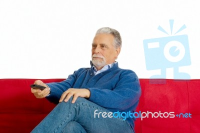 Old Man With Romote Control Stock Photo