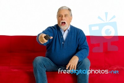 Old Man With Romote Control Stock Photo