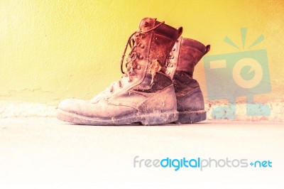 Old Military Boots,old Shoes Concept Background Stock Photo