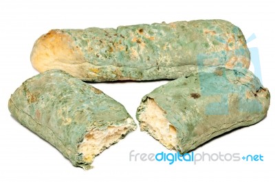 Old Musty Bread On White Stock Photo