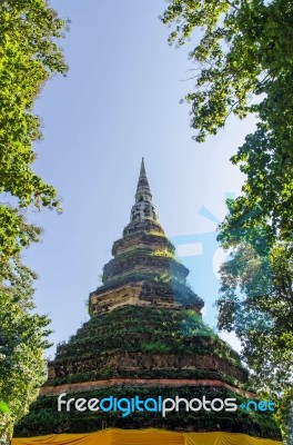 Old Pagoda Made From Brick With Tree And Blue Sky Stock Photo