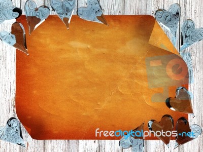 Old Paper On Wood Background With Blue Glass Hearts Stock Image