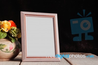 Old Photo Frame On Wooden Stock Photo