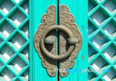 Old Rusty Lock On The Wooden Gate Stock Photo