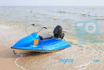 Old Scooter On Sea Beach Stock Photo