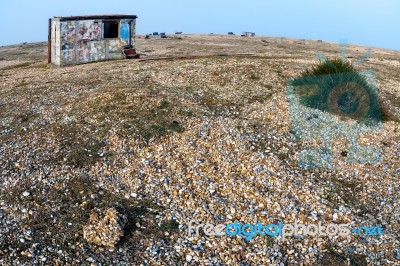 Old Shacks And Boats On Dungeness Beach Stock Photo