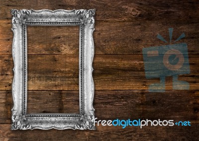 Old Silver Picture Frame On Wooden Background Stock Photo