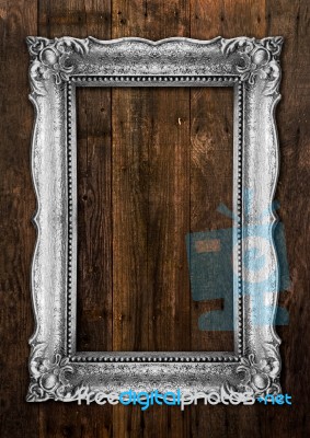 Old Silver Picture Frame On Wooden Background Stock Photo