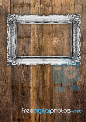 Old Silver Picture Frame On Wooden Background Stock Photo