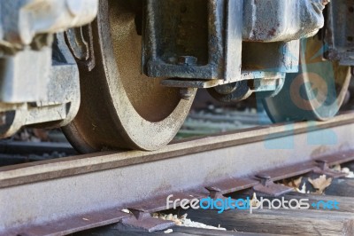 Old Train Wheels And The Road Stock Photo