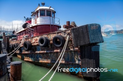 Old Tugboat Moored At The Jetty In Sausalito Stock Photo