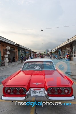 Old Vintage Red Car At Night Market, Srinakarin Road, Thailand Stock Photo