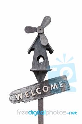 Old Wood Bird House Welcome Sign Stock Photo