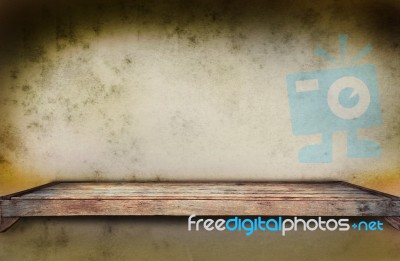 Old Wood Shelf On Grungy Wall Stock Photo