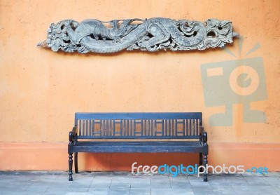 Old Wooden Chair And Snake Carving Stock Photo