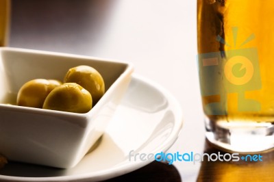 Olives And Beer Stock Photo