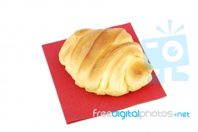 One Fresh Croissant On A Red Napkin Stock Photo