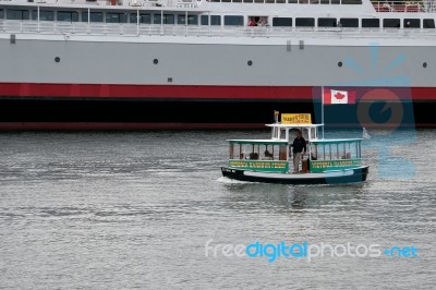 One Of The Many Victoria Habour Ferries Pottering Along In Vict Stock Photo