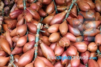 Onions For Sale On A Market Stall In Bergamo Stock Photo