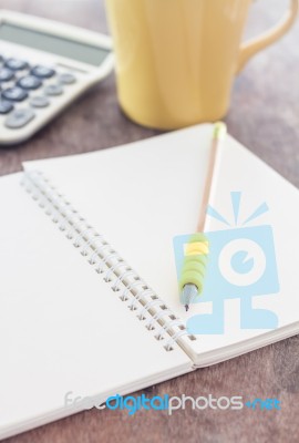 Open Blank Notebook With Pencil Stock Photo