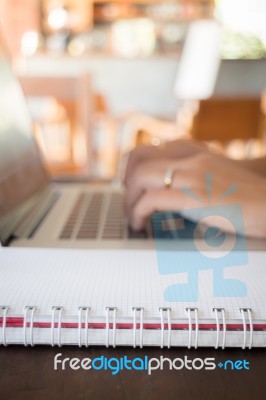 Opened Laptop On Wooden Work Table Stock Photo