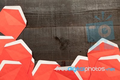 Opened Red Envelopes On Wooden Background Stock Photo