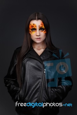 Orange And Red Rhinestones On A Girl Face Stock Photo