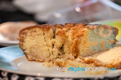 Orange Cake Sliced In Pieces Stock Photo