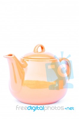 Orange Ceramic Teapot Isolated On White Background Stock Photo