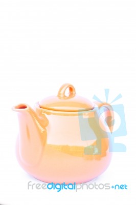 Orange Ceramic Teapot Isolated On White Background Stock Photo