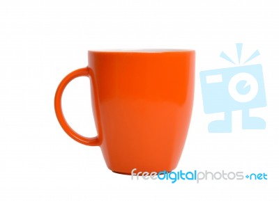 Orange Cup On A White Background Stock Photo