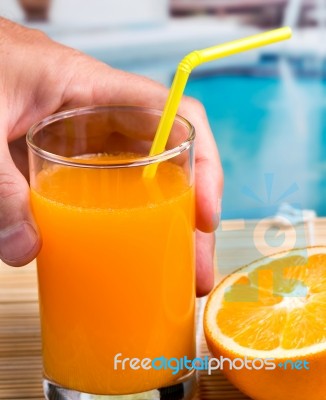 Orange Juice Fresh Indicates Swimming Pool Drink And Oranges Stock Photo