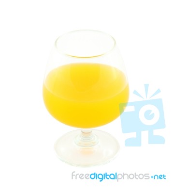 Orange Juice In Brandy Glass On White Background Stock Photo