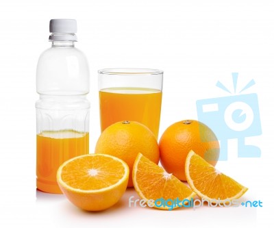 Orange Juice In The Plastic Bottle And Glass Stock Photo