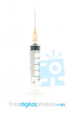 Orange Syringe Isolated On White Background On Vertical View Stock Photo