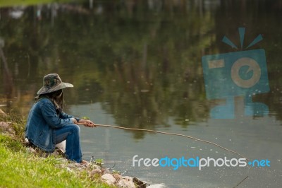 Ordinary People Fishing At The Lake Stock Photo