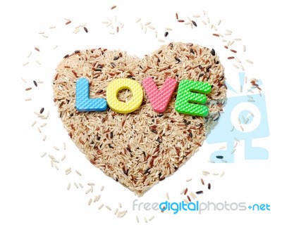 Organic Brown Rice With Love Stock Photo