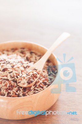 Organic Dry Multi Grain Rice In Wooden Bowl Stock Photo