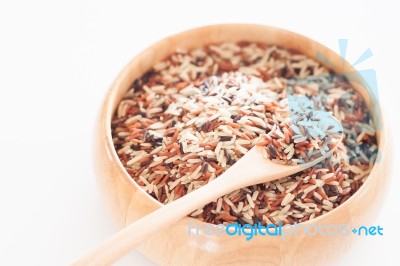 Organic Dry Multi Grain Rice In Wooden Bowl Stock Photo