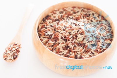 Organic Dry Multi Grain Rice In Wooden Bowl Stock Photo