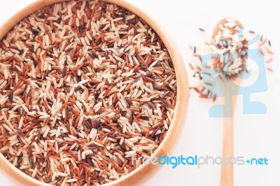 Organic Dry Multi Grain Rice In Wooden Bowl Stock Photo