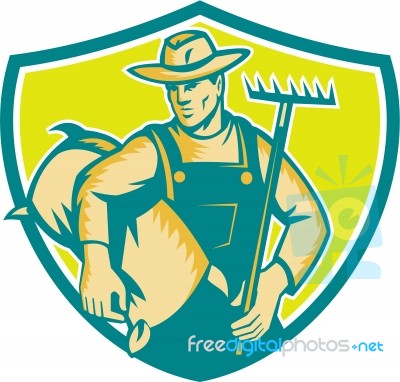 Organic Farmer Rake Sack Shield Woodcut Stock Image