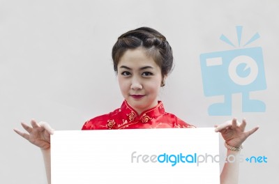 Oriental Girl Holding Blank Board Stock Photo