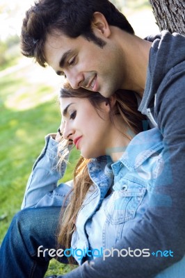 Outdoor Portrait Of Young Caucasian Couple At The Park Stock Photo