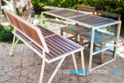 Outdoor Table And Chair In Garden Stock Photo