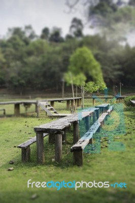 Outdoor Wooden Furniture In Field Stock Photo